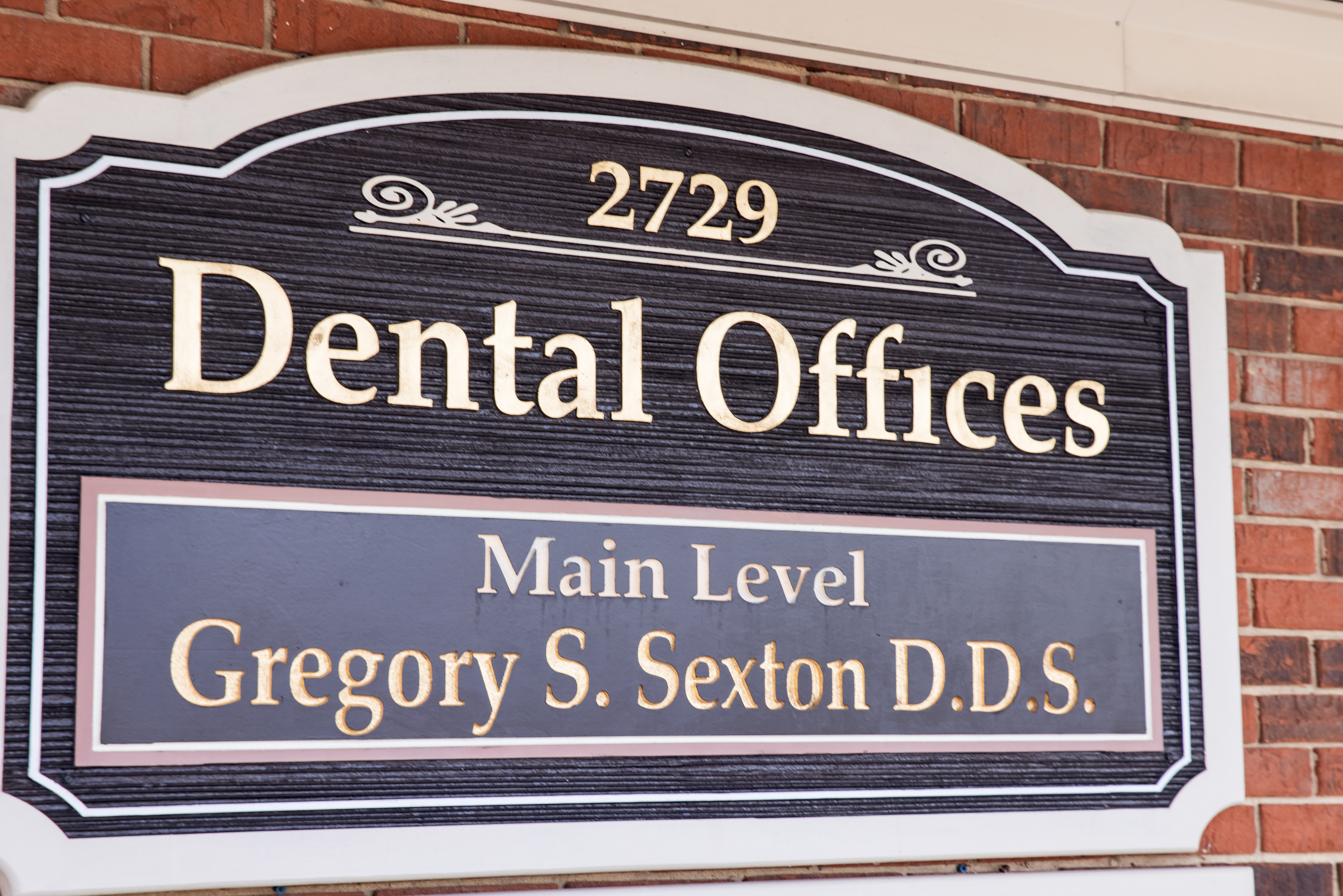 Greg Sexton DDS Logo