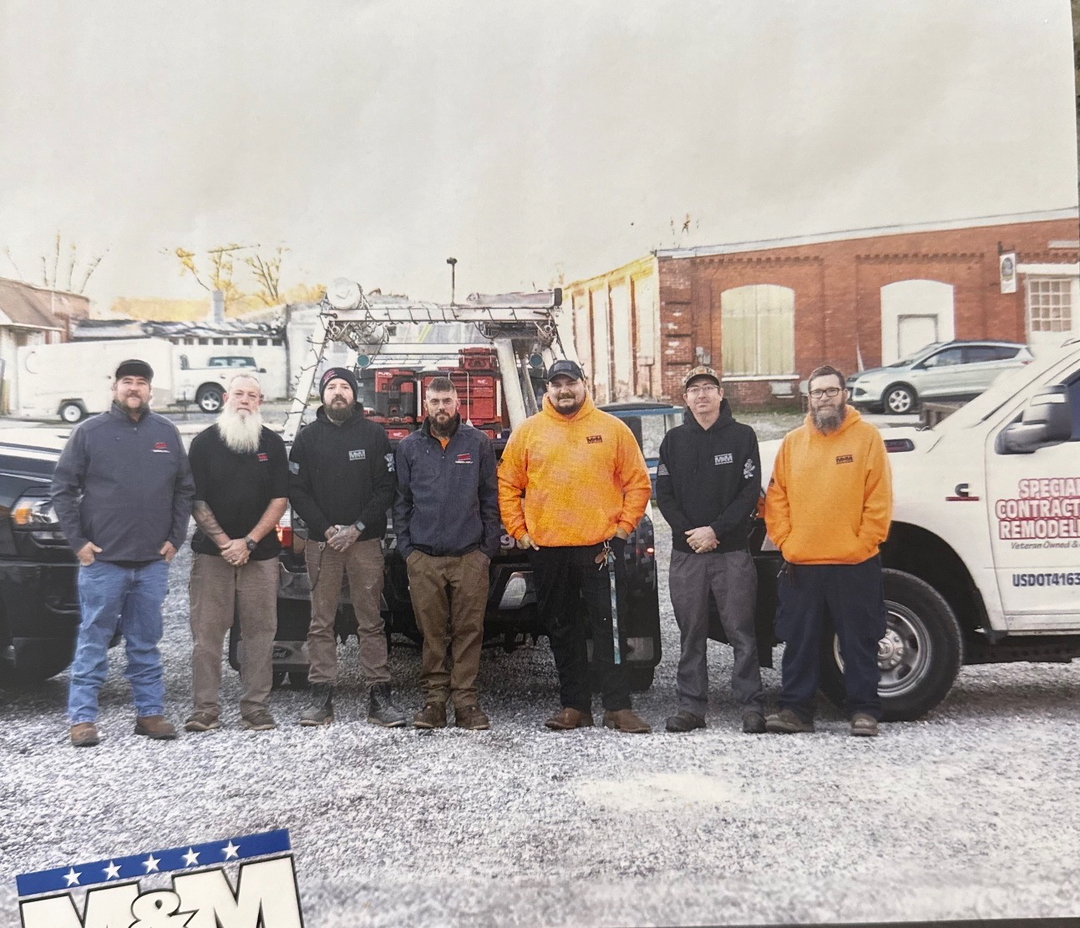 M&amp;M Specialty Contracting and Remodeling Logo