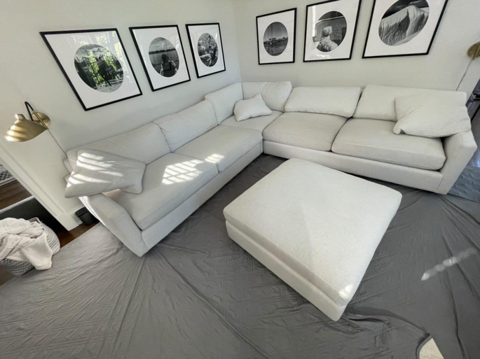 Johnny On The Spot Carpet, Upholstery &amp; Oriental Rug Cleaning Logo