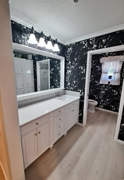 TLC Remodeling and Renovations Logo