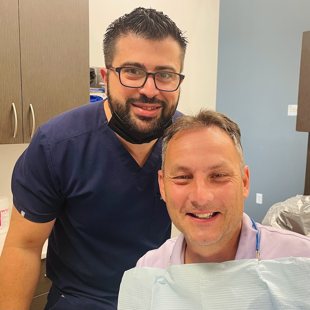 SmileCentric - Cosmetic Dentist / Dental Implant Center Logo