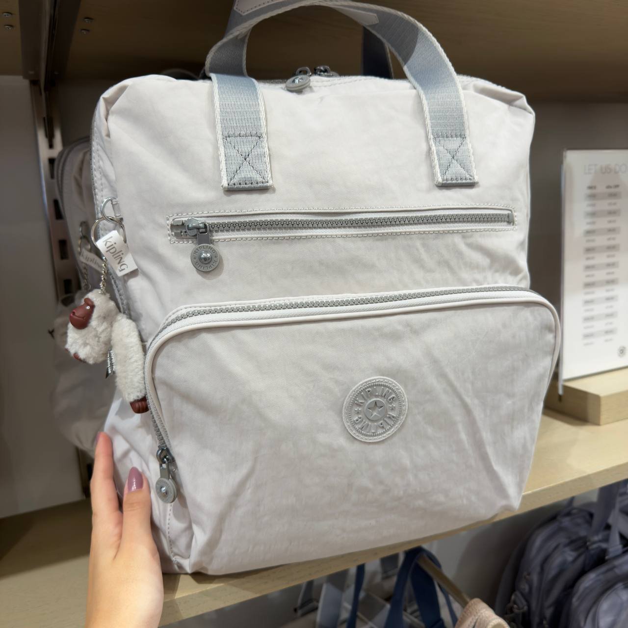 MOCHILA MATERNIDADE AUDRIE COM ALÇA DE MÃO E TROCADOR