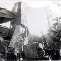 USS Blessman with battle damage