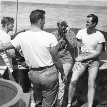 Robert H. Hamilton on the far right on a landing craft
