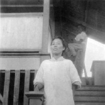 Asian woman on stairs