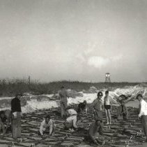 Rubber hose filled with tetratol explosives