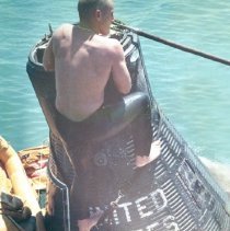 Mercury capsule with a flotation collar attached