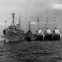 4 photos of ships, sailors and hard hat diver