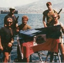 ve SEALs standing with the Hatian flag