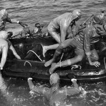 Exposure-suited frogmen