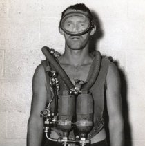 Front view of UDT wearing a Draeger rebreather.