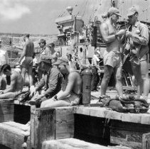 Divers waiting on dock