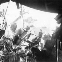 USS Blessman with battle damage