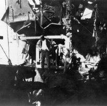 USS Blessman with hole in side