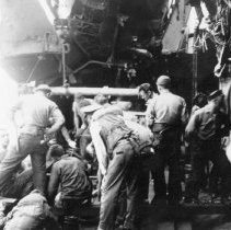 USS Blessman with battle damage