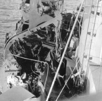 USS Blessman with hole in side