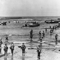 Marines and landing craft come ashore