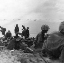 US Marines remove wounded from beachead.