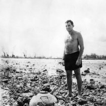 Lt.(jg) 'Butch" Robbins and a J-13 mine.