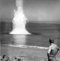 Lyon working with mine sweeping off of Wonson, Korea, 1951. Series of three