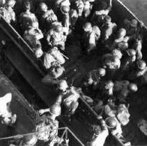 #12 Morotai Shore party shown boarding landing craft to go ashore