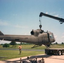 UH-1B Helicopter in Missouri being prepared for transport to Museum