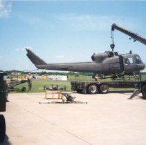 UH-1B Helicopter in Missouri being prepared for transport to Museum