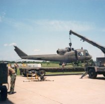 UH-1B Helicopter in Missouri being prepared for transport to Museum