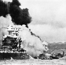 U.S.S. Maryland slightly damaged;  U.S.S. Oklahoma at right.