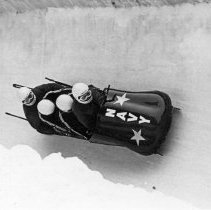 Navy Bobsled Team taking a run