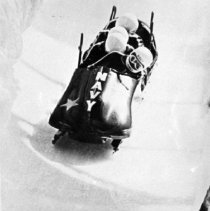 Four-Man Bobsled Team taking a run.