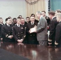 President L. B. Johnson giving award to members of ST 1