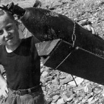 child with unexploded bomb, France