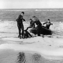 UDTs with rubber boat on ice floe