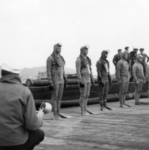 UDTs in a line wearing exposure dry suits