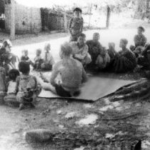 OSS Maritime Unit sitting with natives