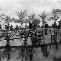 sailors crossing a bridge in Fort Pierce