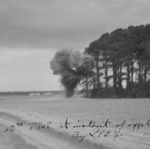 field with explosion 10 lbs TNT