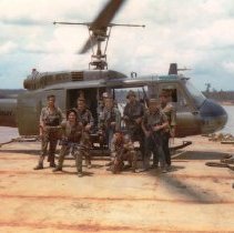 SEALs in front of Army Helicopter