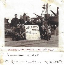 members of UDT9 returning home in 1945
