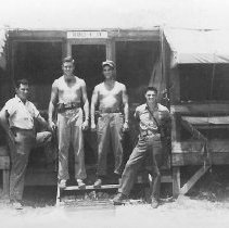 4 Men In Front Of Boq