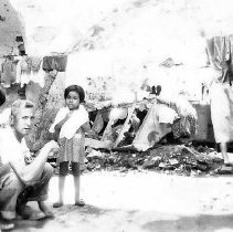 Sailor With Village Children