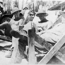 Smoke Break On Wooden Chairs