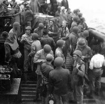 Group On A Boat With Rubberboat On Deck