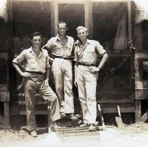 3 Men In Front Of Tent