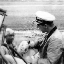 Man In Jeep Near Child