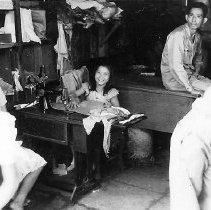 Philipino Girl At Sewing Machine