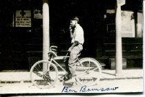 Ben Bowsaw on a bike in front of Barth Store