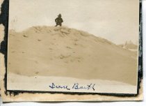 Irene Barth atop a large pile of ice
