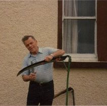 Martin McHugh with scythe in Roscommon